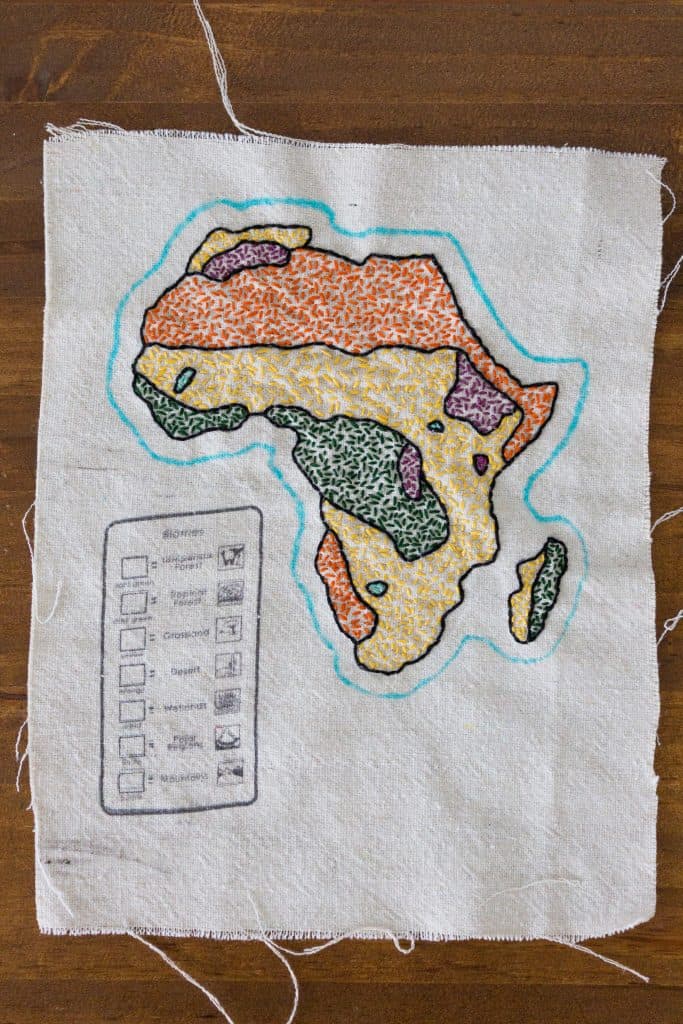 The map of the biomes of Africa has been embroidered and is now ready to be cut out. You can download biome map templates from Waseca Biomes.
