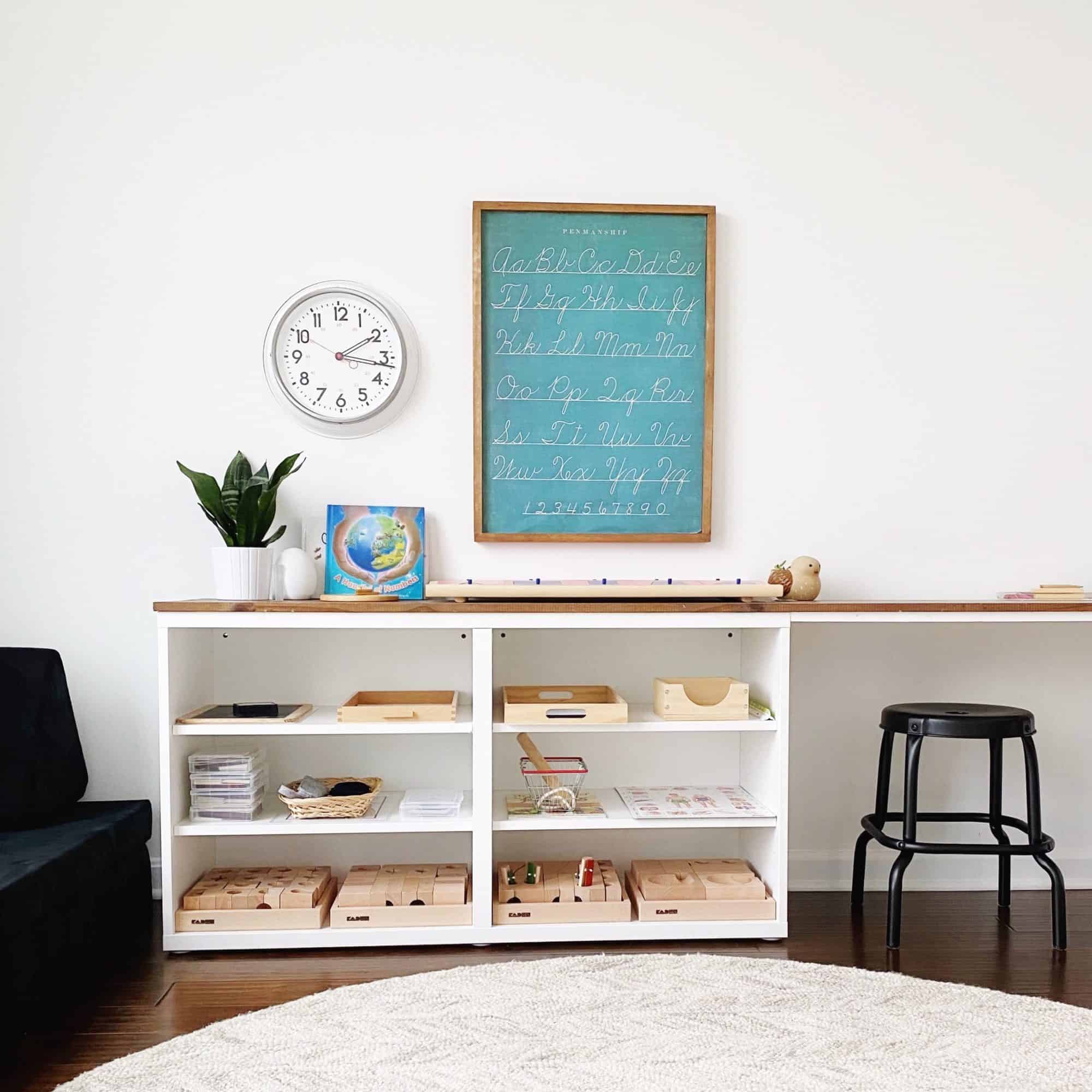 Tour a Montessori-inspired schoolroom + playroom for multiple children at www.freeandunfettered.com. You can also download a free guide to help you design your own prepared environment for your children at home. #montessori #designingspacesforchildren #preparedenvironment #montessoriathome #homeschoolroom #homeschooling