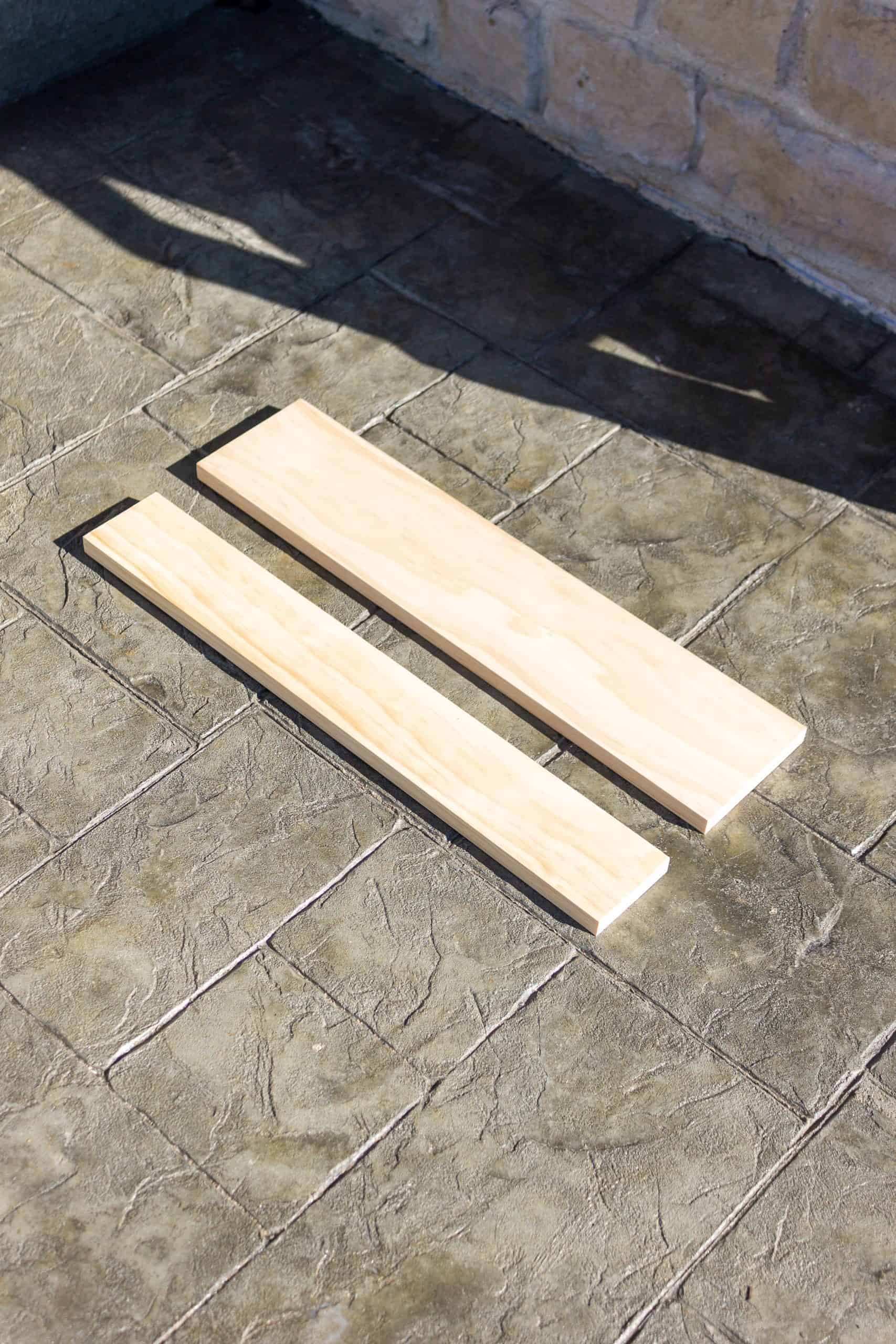 Use just a 1" x 6" select pine board and a dowel to build a DIY Wooden Peg Rail Shelf with Mail Holder for as little as $30 dollars. 