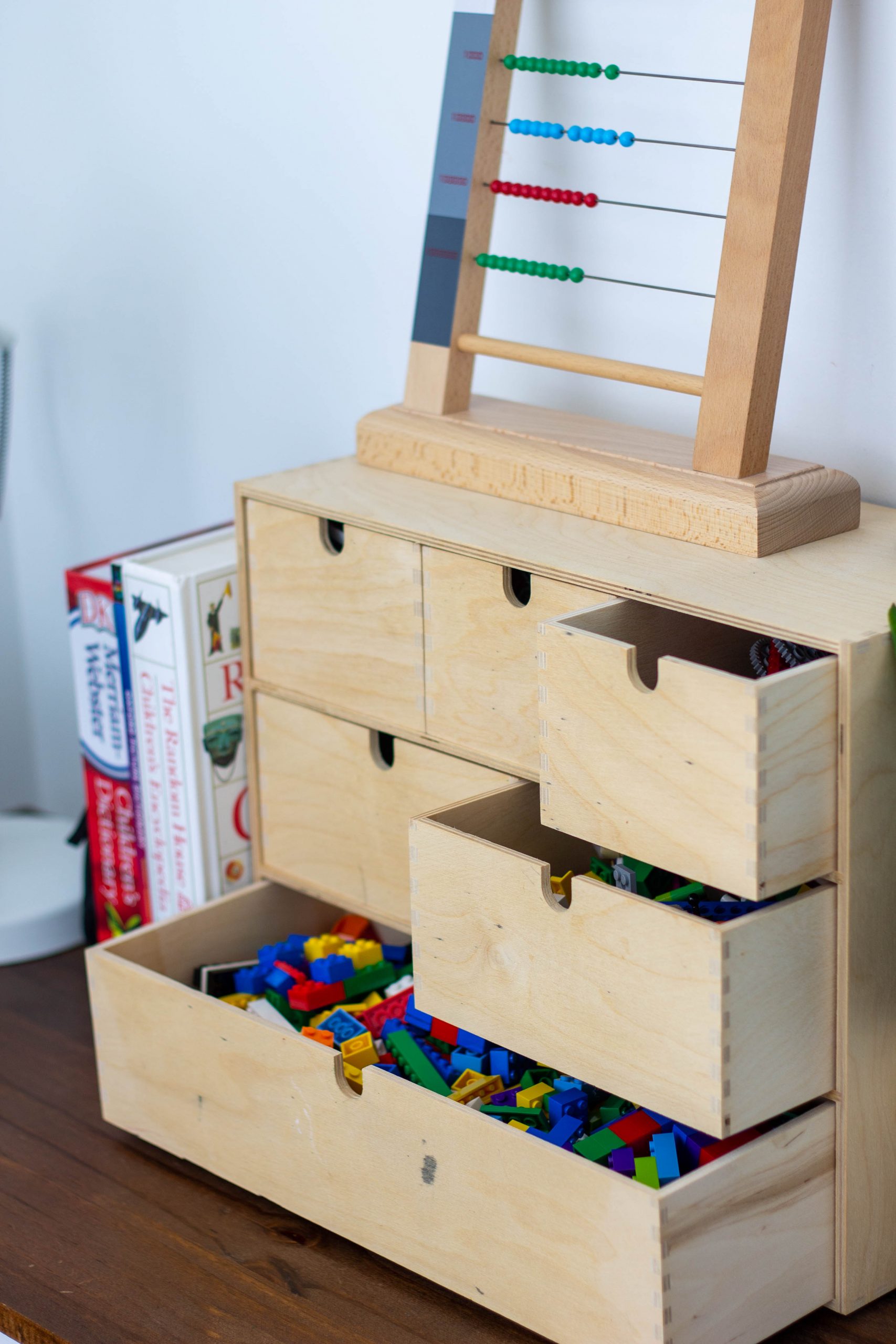 IKEA's MOPPE mini storage chest is a great way to organize and store LEGO bricks. 