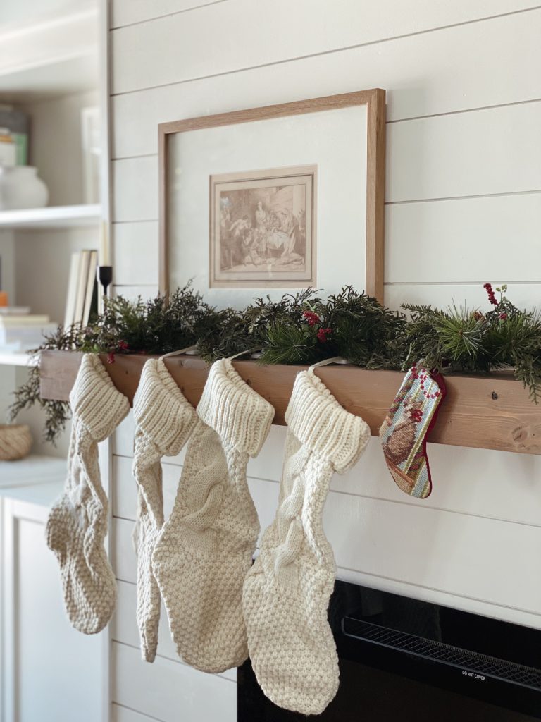 Christmas stockings hung on a mantel