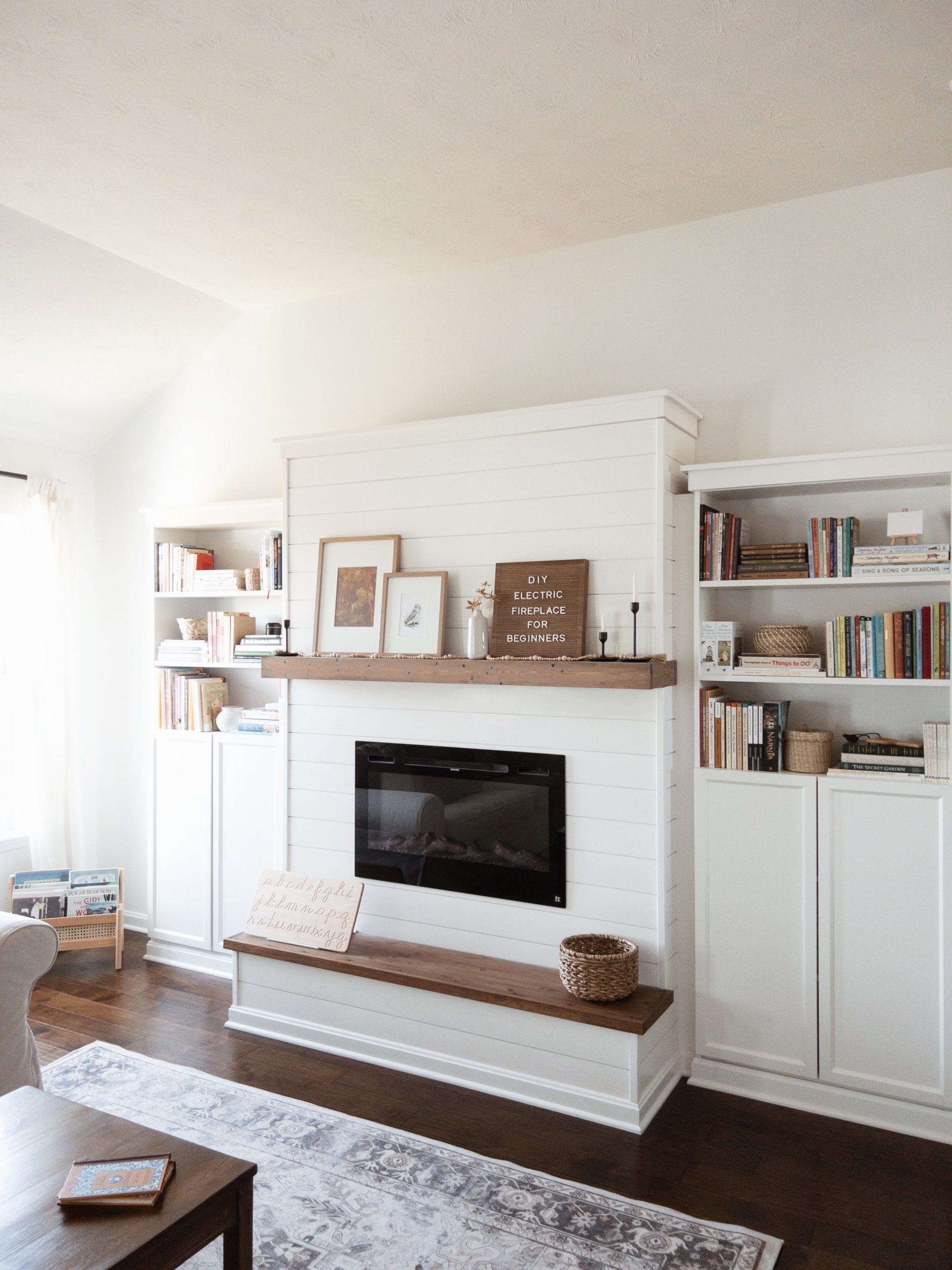 How to build a DIY Electric Fireplace with Built-In Bookshelves from IKEA. You can have your very own fireplace and mantel this holiday season. Follow our step-by-step tutorial to learn how today!